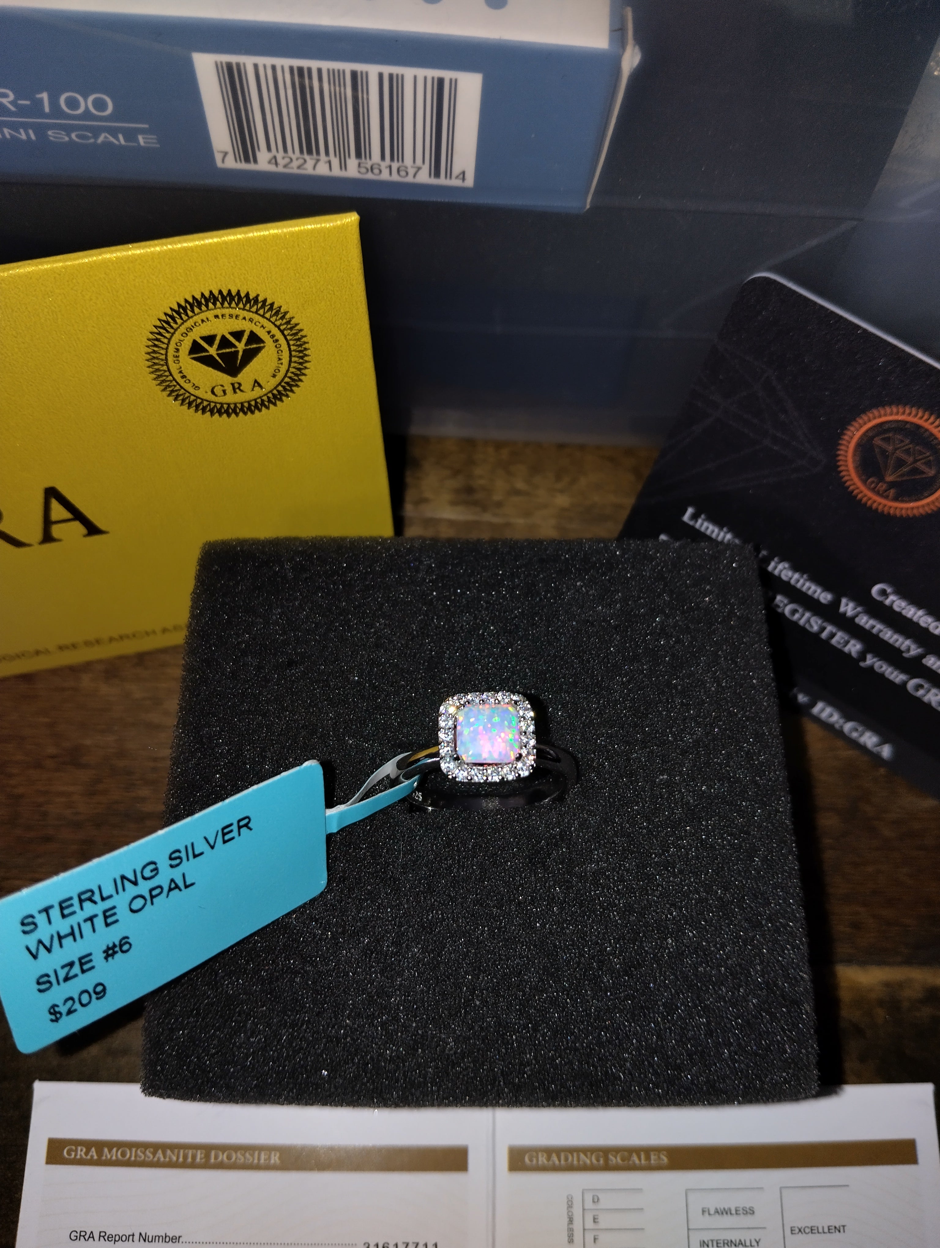 Beautiful Opal Woman's Ring With Stunning Moissanites Surrounding