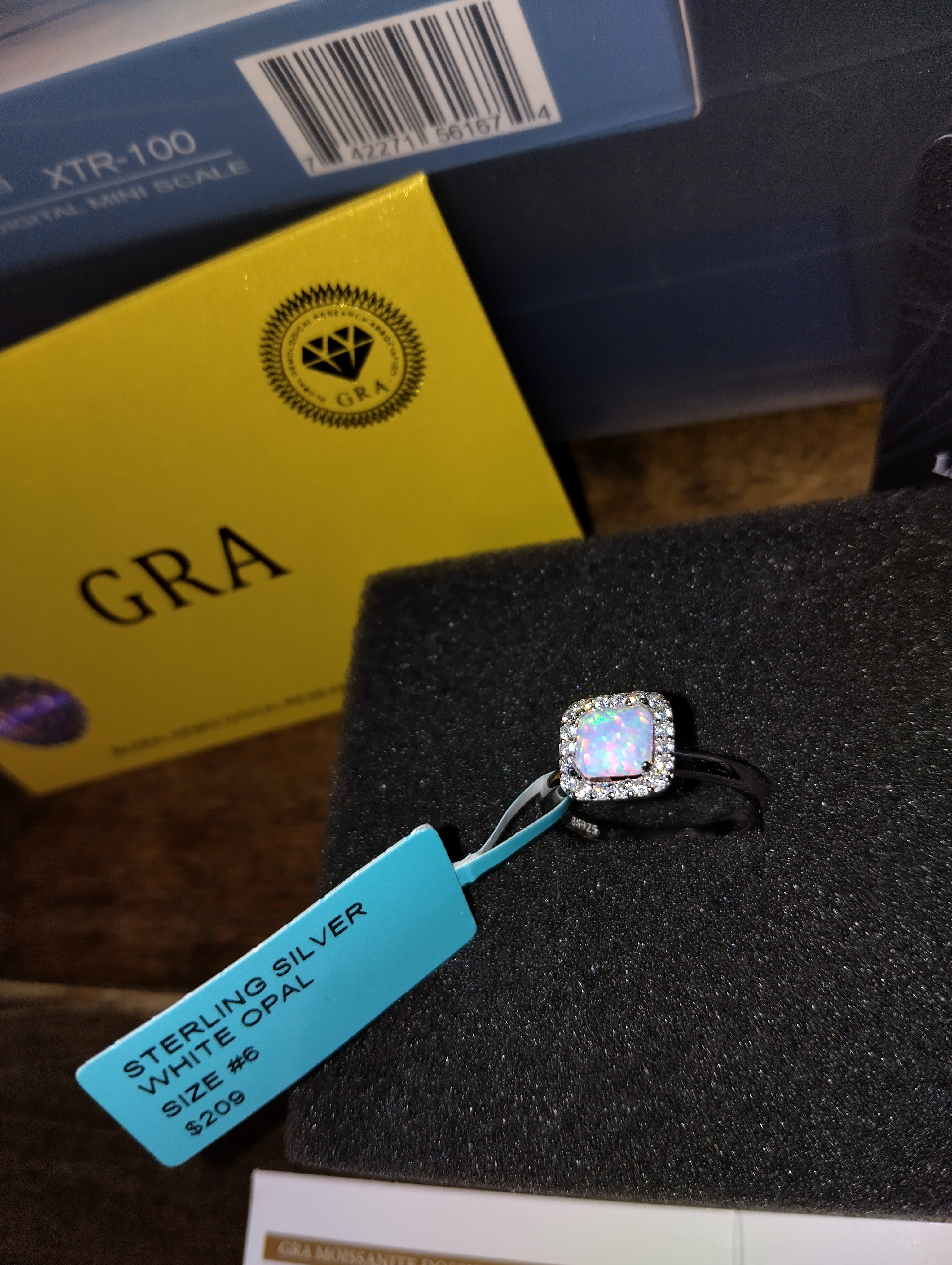 Beautiful Opal Woman's Ring With Stunning Moissanites Surrounding
