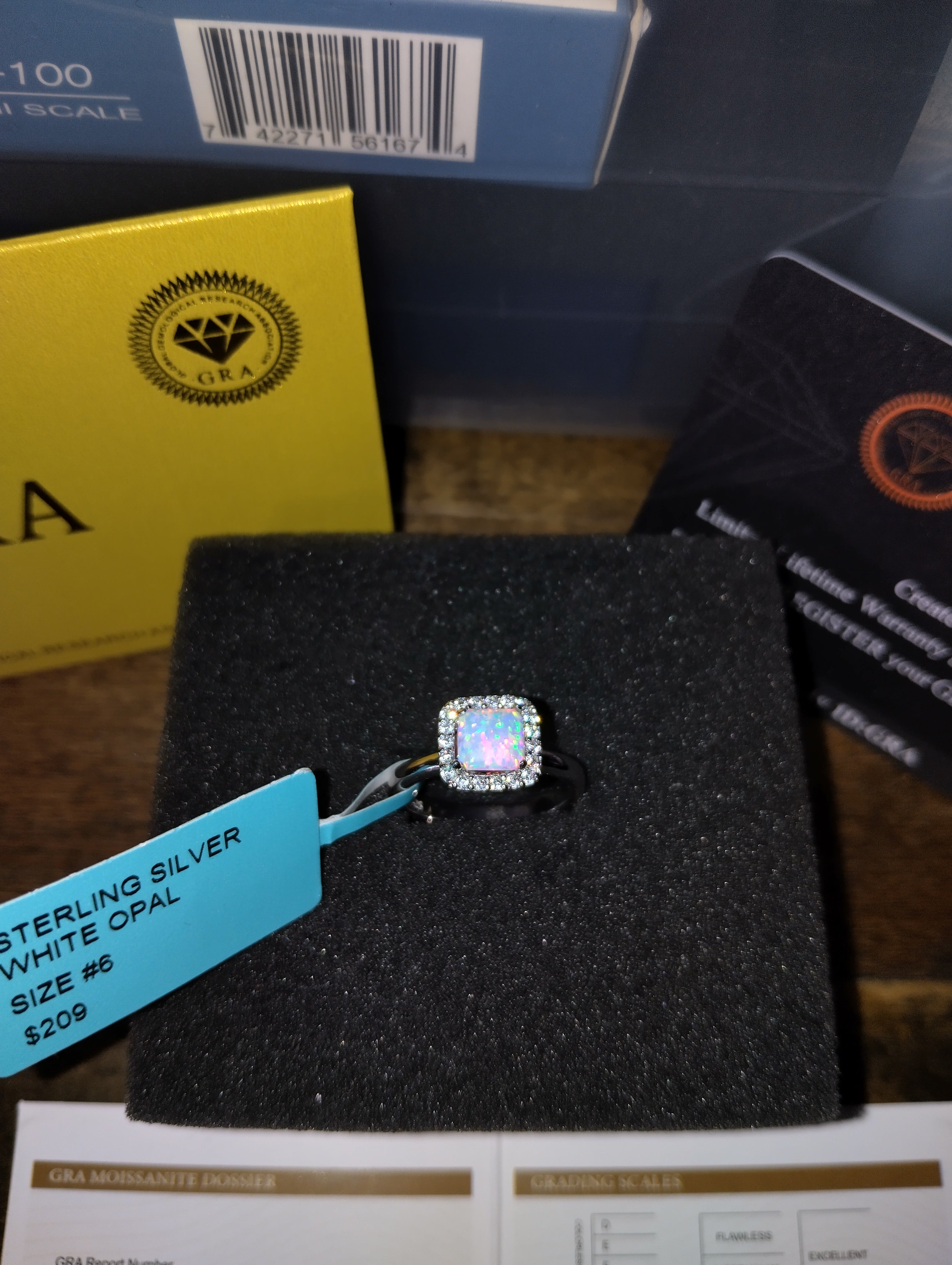 Beautiful Opal Woman's Ring With Stunning Moissanites Surrounding